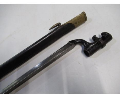British socket bayonet with triangular form blade, stamped with broad arrow mark WD crowned 28 BSA W.CO.L.77, complete with l