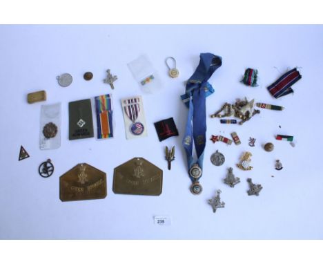 Collection of military cap badges, incl. Green Howards, Yorkshire Regt etc, with brass plaques, Masonic medals, enamel badges