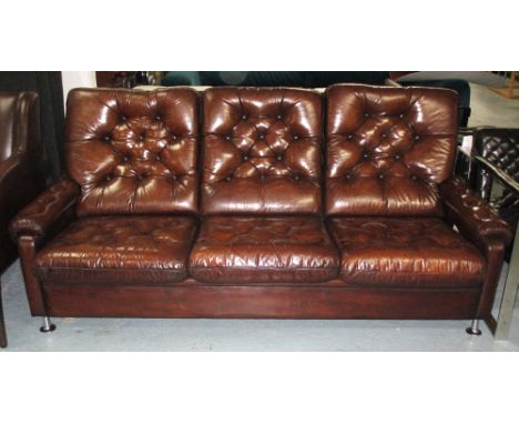 SOFA, 1970's brown leather with three cushion back and seat and outswept chrome supports, 195cm W.