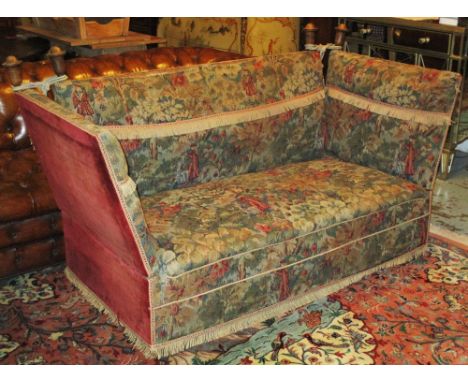 KNOLE SOFA, mid 20th century in tapestry style covers with burgundy velvet backing, drop down arms and castors, 145cm x 75cm.