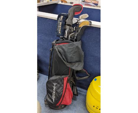 A set of Dunlop golf clubs with golf bagLocation: SR 