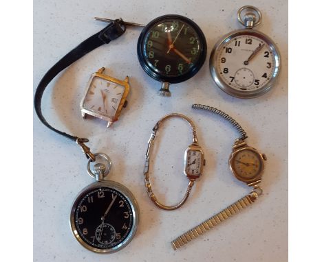 A military black faced pocket watch (glass case deficient) stamped GSTP 24012 to the reverse, on a leather strap together wit