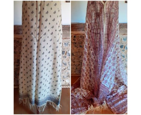 A mid 19th Century Victorian wool gazar crinoline shawl A/F having a wide border in crimson and blue with botehs and floral i
