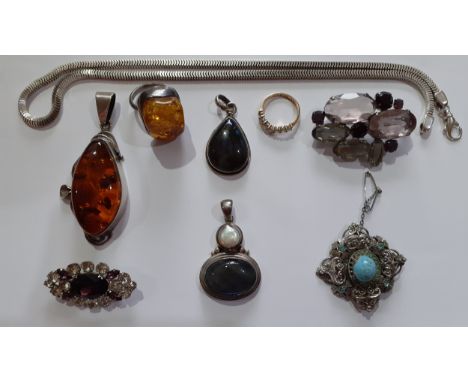 A quantity of costume jewellery to include a Modernist white metal and amber pendant and ring, a white metal necklace,  a lab