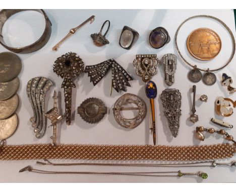 Early 20th Century silver, white metal and paste costume jewellery to include a white metal and moonstone ring and 2 others (