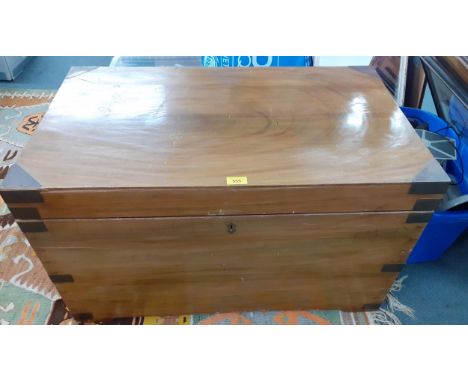 An early 20th century trunk with metal brackets and corners having handles to the side, Location: BWR 