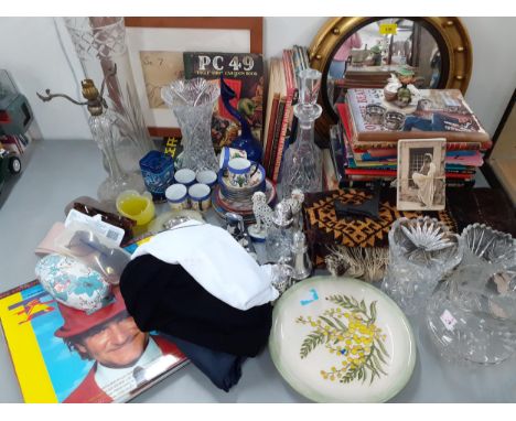 A mixed lot to include children's annuals, a circular mirror, silver plate, cut glass, a blue Wedgwood Jasperware lighter, Lo