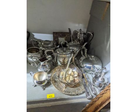 A selection of silver plate to include Victorian teapots, a photograph frame, and other items Location: 