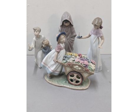 A group of three Lladro figures to include 'Loves Tender Token', 'To Light the Way' A/F, boy and girl figure group, and a boy