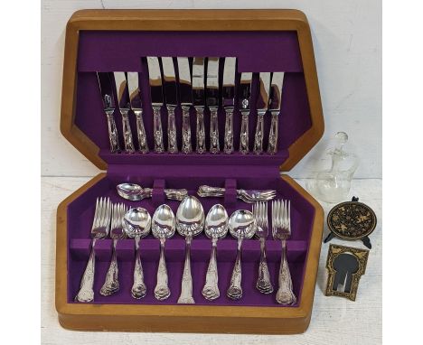 A silver plated Kings pattern canteen of cutlery, together with Continental small picture frame, matching dish and a small cu