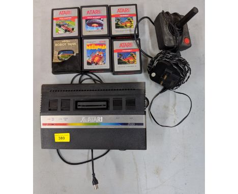 A boxed Atari video computer system 2600 with six games, Robot Tank, Millipede, Centipede 1987, Centipede 1988, Space Invader