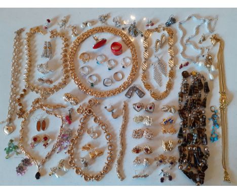 A quantity of 20th Century costume jewellery, mainly 1980's to include gold tone necklaces, a Tiger's Eye necklace, a Nina Ri