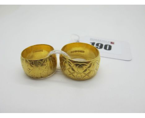 A 22ct Gold Wide Patterned Wedding Band, (finger size R); together with a smaller 22ct gold wide patterned wedding band (appr
