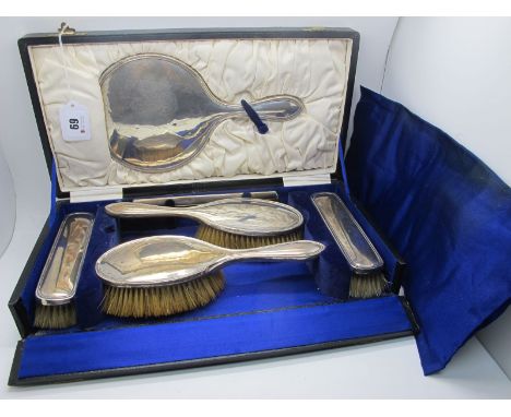 A Hallmarked Silver Backed Dressing Table Set, in original fitted case with matching comb (teeth loss) (damages). 