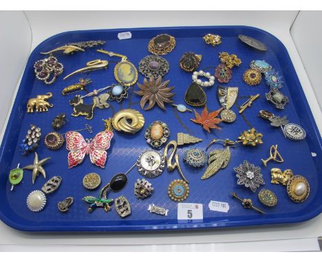 A Collection of Vintage and Later Brooches, including cameo style, diamanté, floral sprays, foliate inspired, animals, Celtic