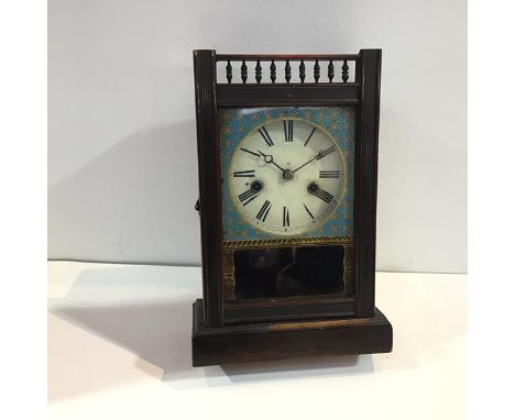 A German Aesthetic Movement style ebonised mantel clock, by Teutonia Clock Manufactory, the white enamel dial with Roman nume