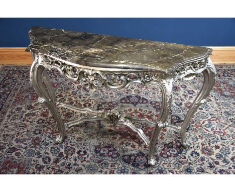 A reproduction marble-top serpentine fronted console table with carved decoration on cabriole supports, width 128cm, depth 41