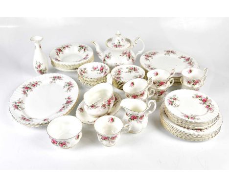 ROYAL ALBERT; a tea/dinner service decorated in the 'Lavender Rose' pattern, various plates, a teapot, etc.
