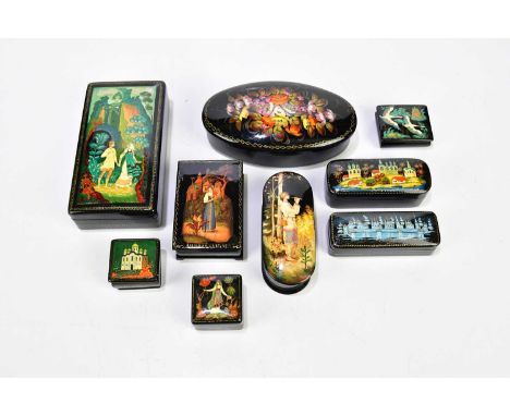 Eight 20th century hand painted Russian lacquered boxes, various scenes including a Queen of the Copper Mountain scene, 15 x 