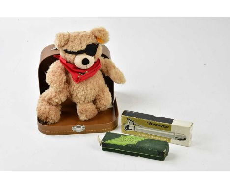 STEIFF; a modern boxed bear, a Hohner Echo-Luxe harmonica and a Donatus cigar cutter (3).