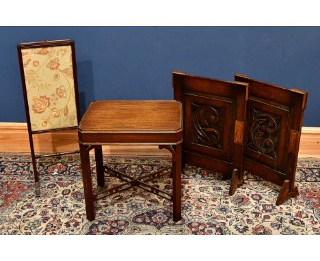 A reproduction mahogany coffee table, height 53cm, width 51cm, a fire screen with tapestry inset panel and two further firesc