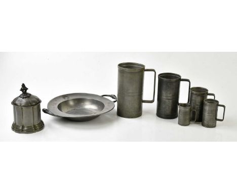 A graduated set of five pewter measures, probably French, a pewter twin handled bowl and a pewter tea caddy and cover with pa