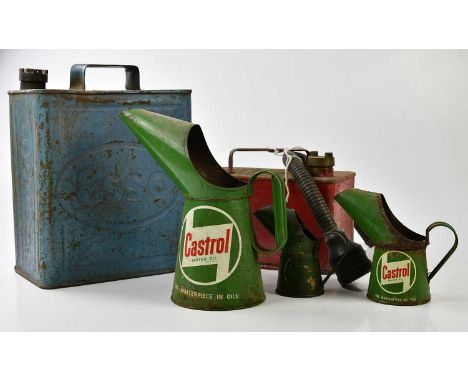 A group of three Castrol oil cans, together with an Esso Jerry can and further oil can.