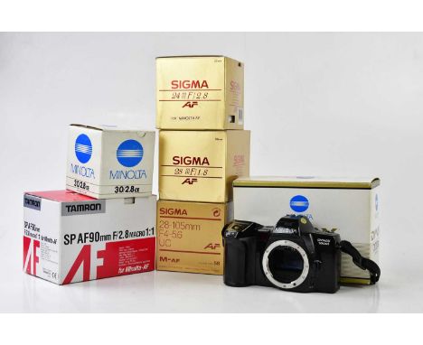 MINOLTA; a Minolta Dynax 700si 35mm film camera, in original box, together with five lenses, including a Sigma 24mm f2.8, 28m