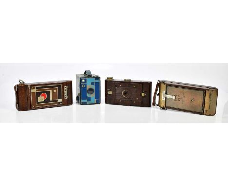 Four Art Deco era cameras, to include a Ensign Carbine Tropical folding camera, a Kodak No2 Hawkette bakelite folding camera,
