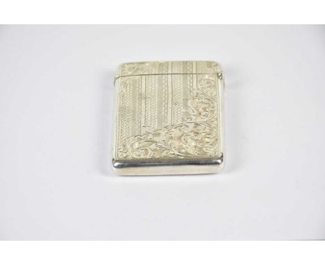 An Edwardian hallkmarked silver card case, with engraved detailing, Birimingham 1910, weight 1.5ozt, length 8.75cm.  Conditio