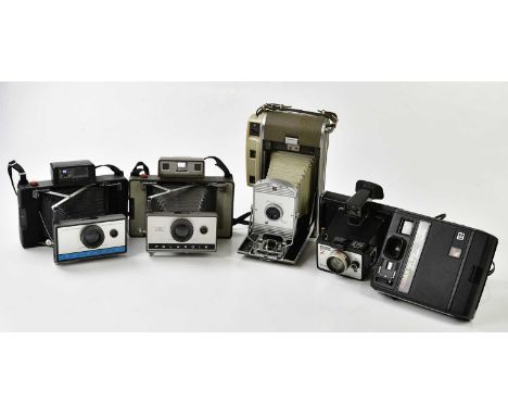 POLAROID; three Polaroid land cameras, to include the 320, the 800 and the 210, all cased with accessories, also including a 