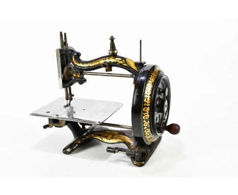 ROBINSONS PATENT; a vintage "The Family Treasure" manual sewing machine, number 10937, height 29cm, length 32cm.Condition Rep