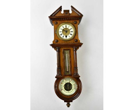 A Victorian walnut cased wall clock, thermometer and barometer, with white enamel dial set with Roman numerals, 67cm.