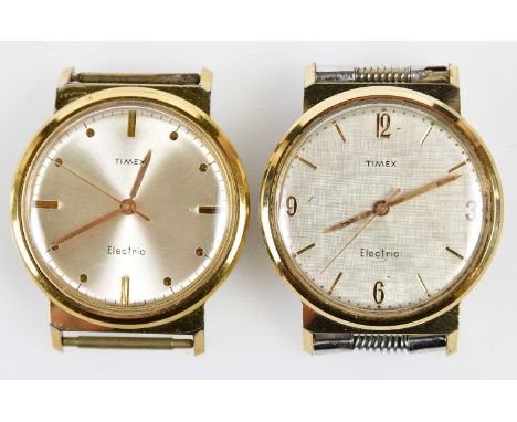 TIMEX; two stainless steel electric wristwatches, a Timex electric time zone wristwatch, and a further Timex electric wristwa