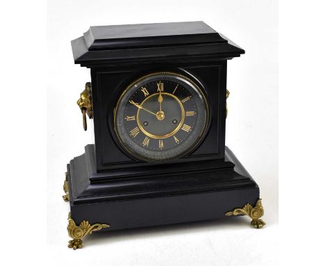 A late Victorian eight day black slate mantel clock, with Roman numeral chapter ring, height 32cm, a modern palm tree table l