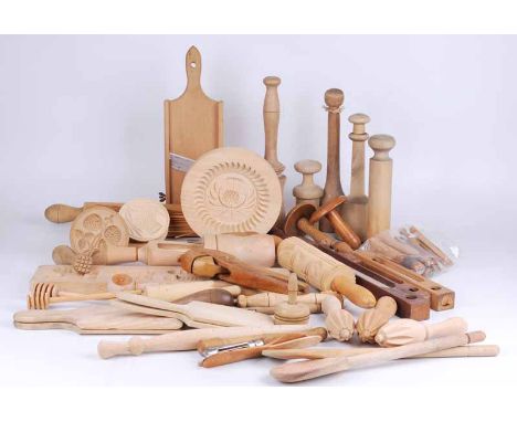 A good collection of vintage and later traditional kitchen utensils including butter pats, pie formers, gingerbread and butte