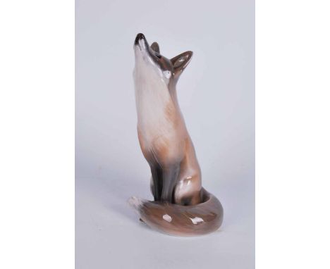 Royal Copenhagen large porcelain model of a seated fox looking up, model number 437 26cm Height