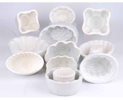 A collection of 12 vintage assorted jelly moulds, various sizes