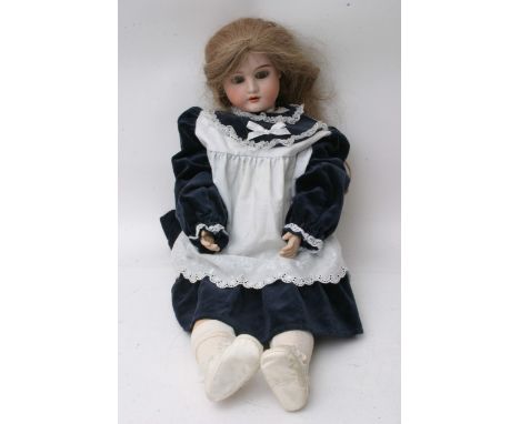 An Early 20th century Simon Halbig bisque head doll with a composition body the head with 1906 stamp and 10, 