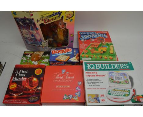 A boxed vintage Barbie 'The Nutcracker' horse and carriage set alongside a boxed Dancing Pooh and Belle and Barbie children's