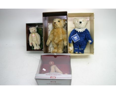 Four boxed Steiff bears comprising a limited edition Delfter, a 1906 replica, museum collection '91-'92 and a replica from 19