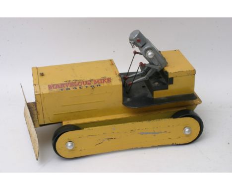 A tin plate Marvellous Mike tractor toy with robot driver.