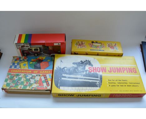 A boxed Pelham "horses" puppet, a Britains Land Rover and horse box No9650, a boxed 1960s games compendium and a boxed show j