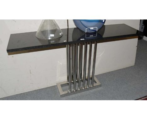 A Decorus Console Table, from their "Milan" range, with tubular stainless steel base and black granite top, 150cm by 40cm by 