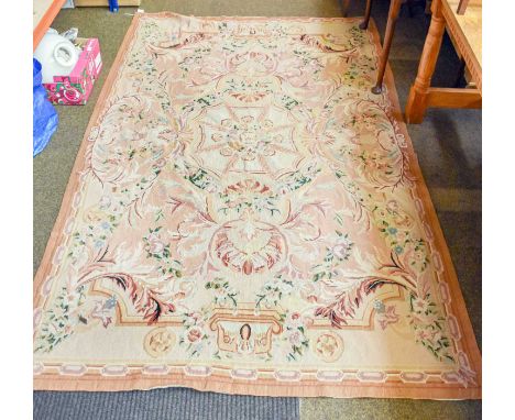 Needlepoint Carpet of Aubusson Design, the tan field of serrated leafy vines centred by a flowerhead medallion, enclosed by s