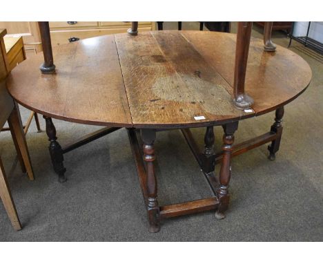 An 18th Century Oak Gate Leg Dining Table, 163cm by 136cm by 72cm 