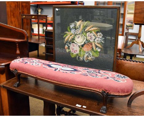 A 1920s Fire Screen from ''The Needlewoman Shop London'', together with a mahogany framed needlework longstool on paw feet, 1