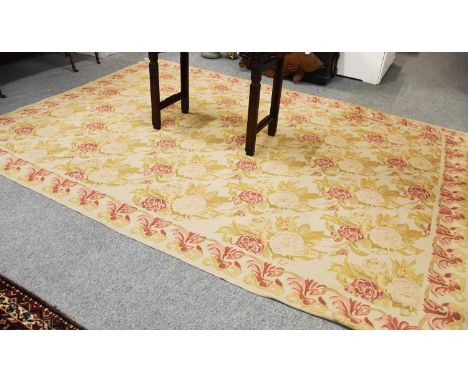 Needlepoint Carpet of Aubusson Design, the wheat field with diagonal rows of floral sprays framed by leafy borders, 346cm by 