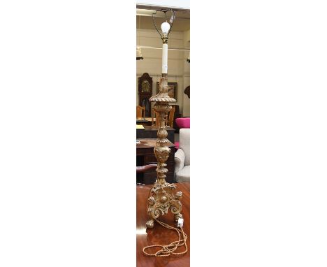An 18th/19th Century Gilt wood and Gesso Candlestick, on figural supports, 89cm not including fittingsEvidence of old worm, m
