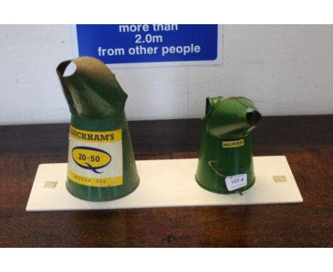 TWO RETRO DESIGNED AUTOMOBILE OIL CANS 